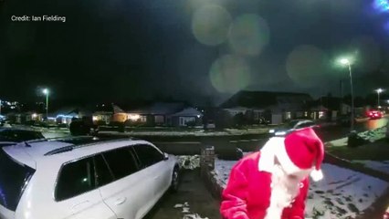 Secret Santa delivers chocolate to houses for Christmas