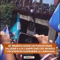 Hinchas se tiraron de puentes para subirse al colectivo de la Selección y suspendieron la caravana