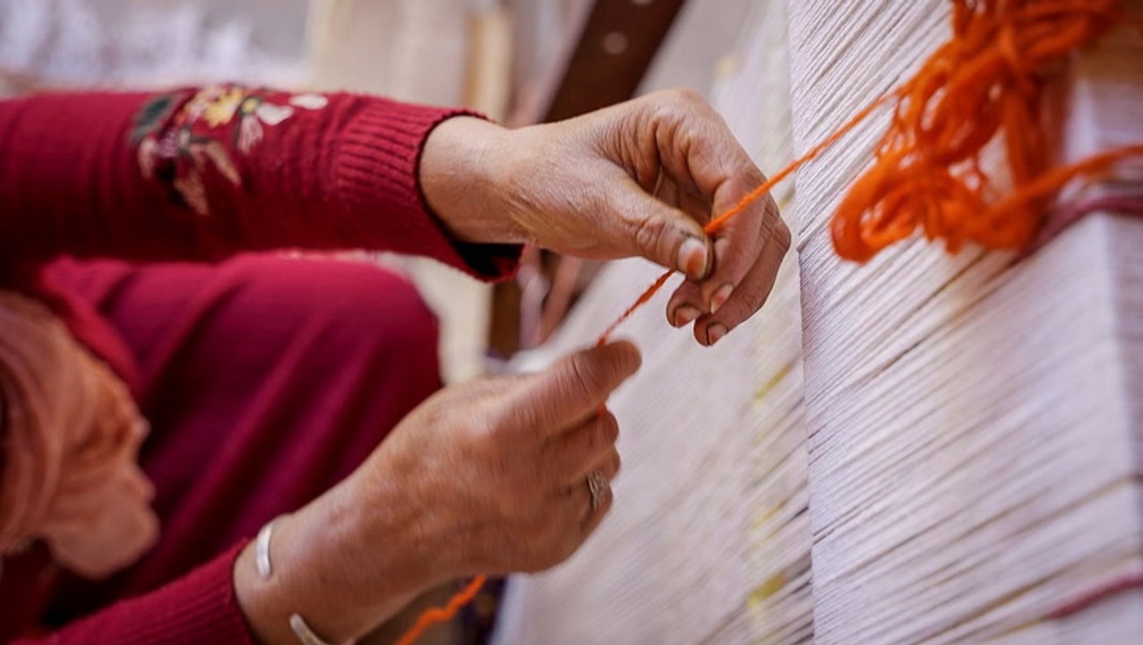 Why artisans receive little profit even though Moroccan rugs can cost over $2,000