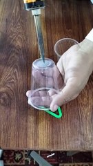 Disposable glass and drinking straw.