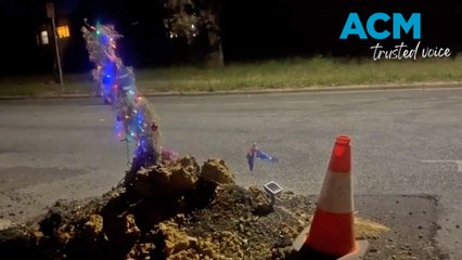 Canberra pothole 'Christmas tree' gets decorated with lights