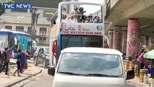Tinubu drive s round Lagos in campaign truck, waves residents