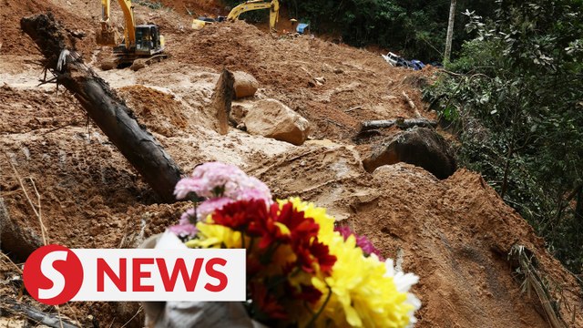 Floral tributes left at site of Batang Kali landslide