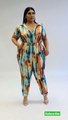 Plus size models lifestyle curvy woman in becca Jumpsuit dress.plus size women Fashion beauty.