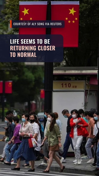 Beijing, Shanghai residents back to work as China eases into living with COVID-19