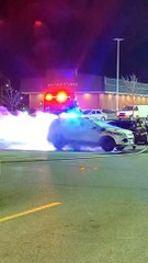 Citizens Try to Put Out Car That Spontaneously Caught Fire in Parking Lot