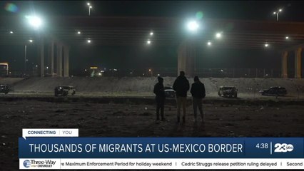 Migrants wait in the cold at the southern border