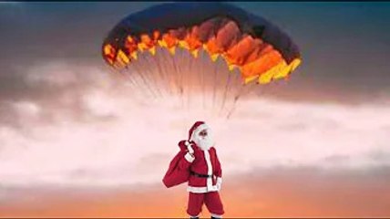 Pere Noel saute du parachute