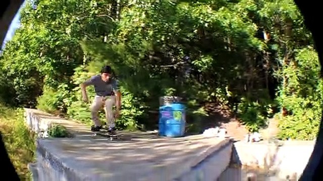 Skateboarder Ollies off ledge onto ramp and slams his head on pavement