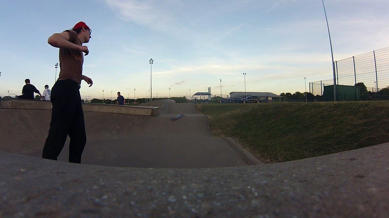 Skateboarder attempts 360 flip from ramp at skatepark and breaks his ankle