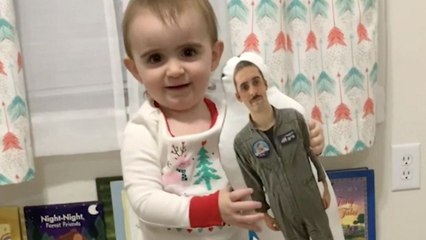 Little Girl's Adorable Reaction To Navy Dad Doll