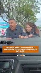 arrastró a dos policías en el capot del auto