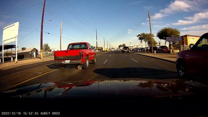 Muffler Suddenly Falls From Pickup Truck