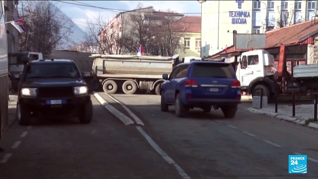 Tensions rise in northern Kosovo as local Serbs block roads