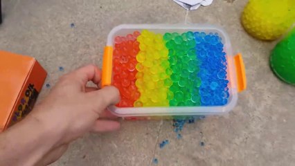 Experiment_ Car vs Rainbow Orbeez Bottles _ Running over stuff with car - SATISFYING VIDEO