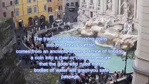Trevi Fountain tourist attractions to take part in a ritual coin toss