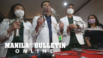 Medical doctors show the supplies used in firecracker victims