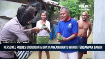 Puluhan Personel Polres Grobogan Bersama Bhayangkari Cabang Grobogan Turun Ke Lokasi Banjir Luapan Sungai Lusi