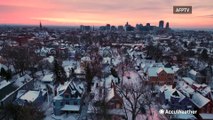 Sunrise shows snow covering Buffalo neighborhoods