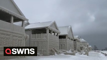 NEW VIDEO: Homes encased in thick layer of ice after storm Elliott wreaks havoc across North America