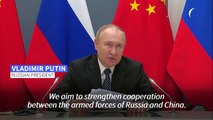 Putin tells Xi he wants to ramp up military cooperation