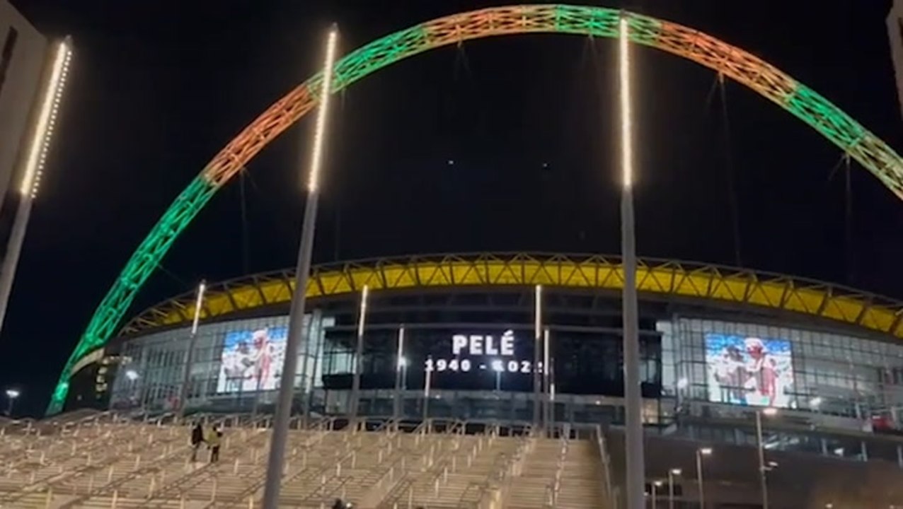 Wembley Stadium arch glows with Brazil’s national colours in tribute to Pele