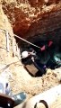 الدفاع المدني ينقذ شخصين سقطا في حفرة عميقة