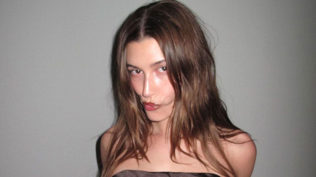 Hailey Bieber Layered a Gauzy, Sheer Slip Dress Over Nothing But a Brown Thong