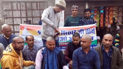 सम्मेद शिखर को पर्यटन क्षेत्र घोषित करने के विरोध में कराया सामूहिक मुंडन
