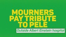 Fans gather to pay tribute outside Pele's hospital