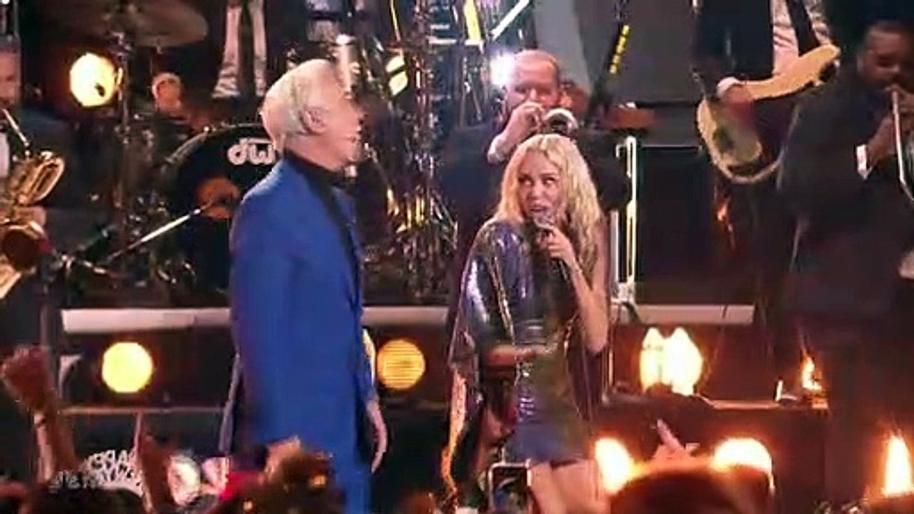 Miley CYRUS COVERS David Bowie's LETS. DANCE