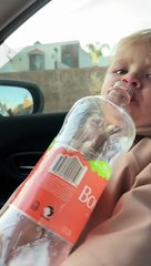 Little Girl Tries to Take a Drink on Her Own