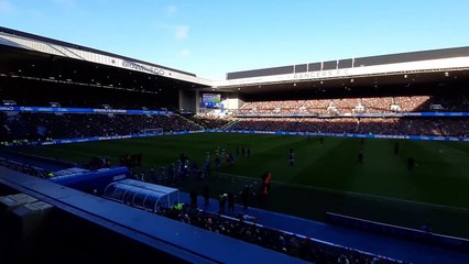 Rangers and Celtic come on to the pitch at Ibrox.