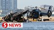 Two helicopters collide in Australia, killing four and three in critical condition