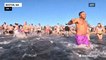 Hundreds of swimmers celebrate the new year with a cold swim