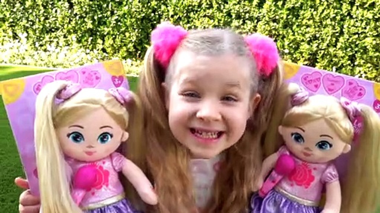 Diana and Roma pretend to play with the new Plush Doll Diana