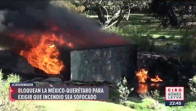 Bloquean la México-Querétaro para exigir que incendio sea sofocado