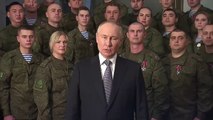 For the first time on New Year's Eve, Putin addressed the Russians with the military, and not against the background of the Kremlin
