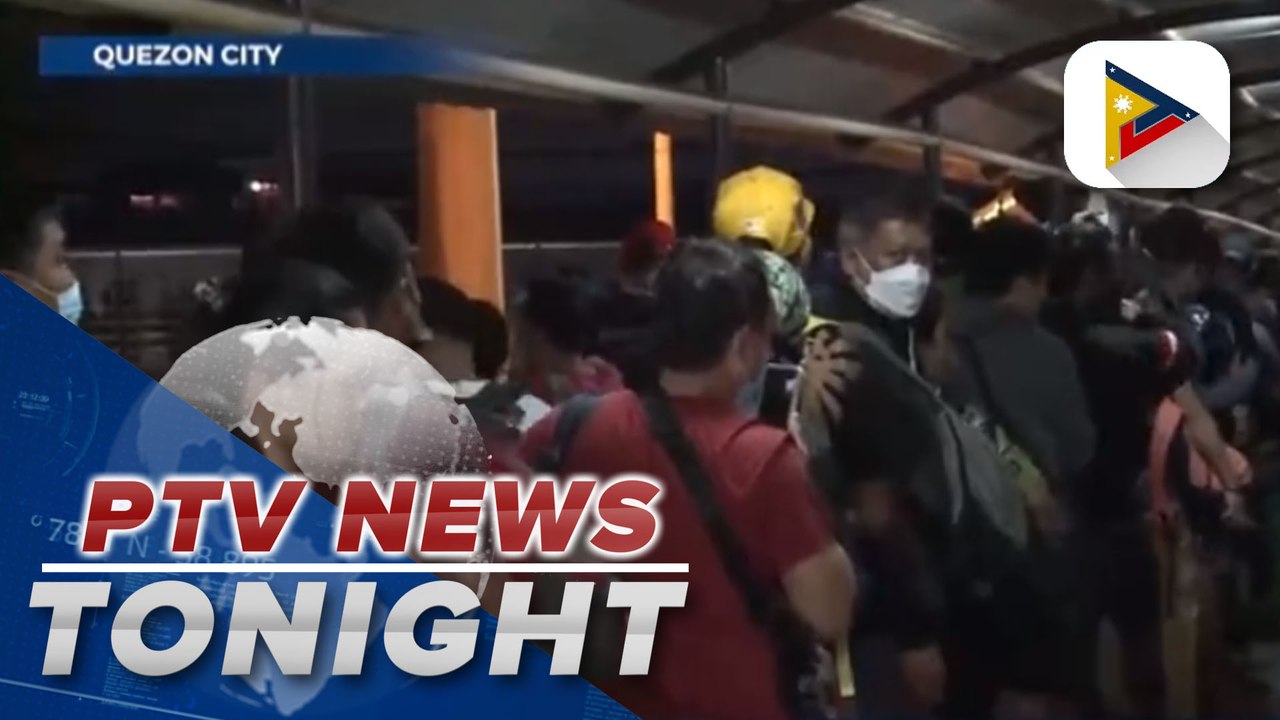 Long lines greet commuters at EDSA Bus Carousel as employees return to work