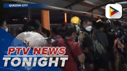 Long lines greet commuters at EDSA Bus Carousel as employees return to work