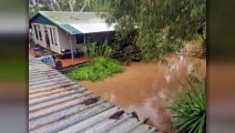 Major floods and wild weather isolate towns across northern Australia as ex-Tropical Cyclone Ellie maintains strength