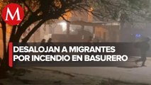 Reportan intoxicación de personas en albergue de migrantes en Reynosa tras incendio de basurero
