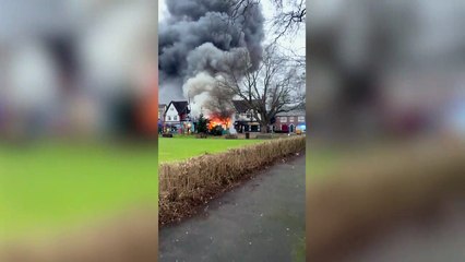 Bus engulfed by fire in Hale, Greater Manchester