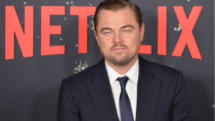 Leonardo DiCaprio photographed with two women