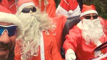 Curitiba, Brazil: Santas in jeep team up with Santas on sleigh to make kids happy