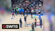 Basketball fan hits half-court shot to win $20,000