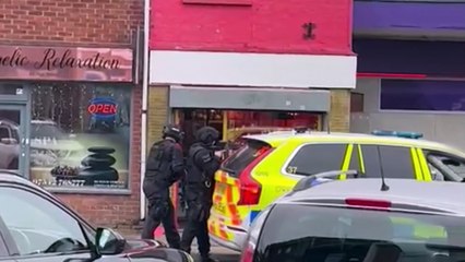 NEW: Police called to 'suspicious' incident outside bank