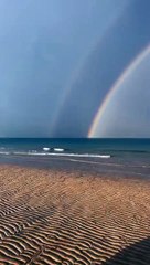 Rainbow forms over Ras Al Khaimah horizon