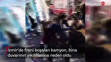 İzmir’de freni boşalan kamyon, bina duvarının yıkılmasına neden oldu