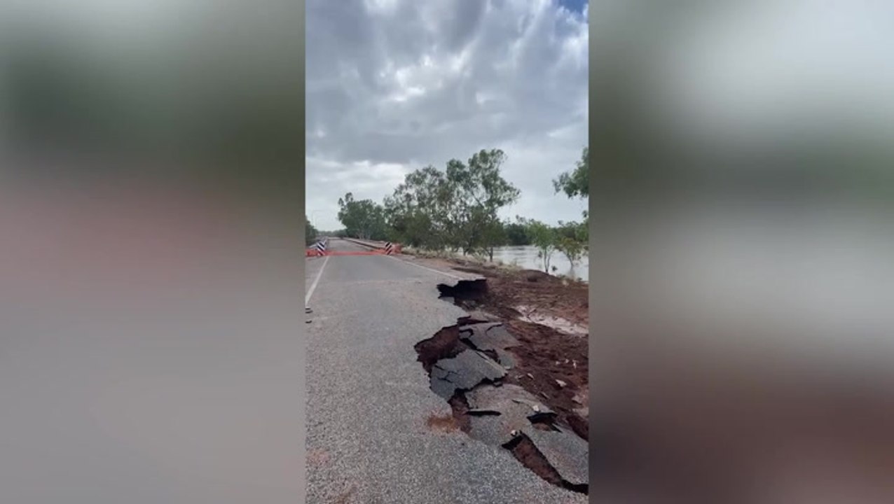 Massive chunk of road swept away after record-breaking flooding in Australia